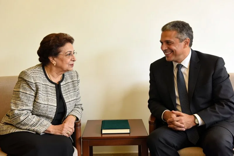 An author and a university president in conversation.